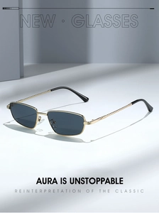 Detailed macro view of high-quality gold metal twisted temples on luxury sunglasses