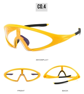 Multi-angle views of yellow cycling goggles with black rubber pads and large lenses