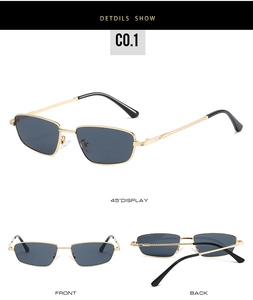 Detailed macro view of square metal frame sunglasses with spiral textured temples