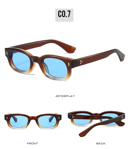 Detail view of vintage square sunglasses featuring amber frames and blue lenses with studs