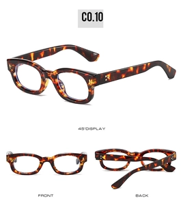 Detailed views of tortoise shell retro square frames with silver star rivets and blue light lenses