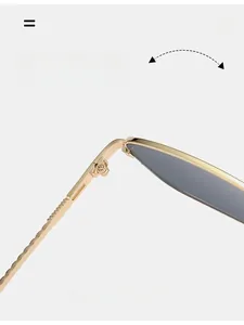 Close-up of durable golden metal hinges and wavy textured temples on square sunglasses