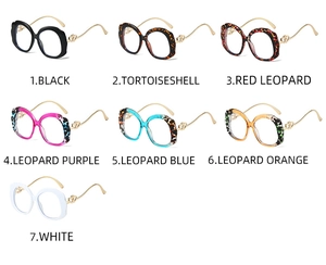 Macro detail of various color frames with stylish wavy edges and golden metal temples