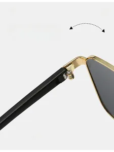 Detail of durable gold metal hinge on square pilot sunglasses with black temples