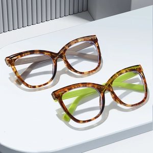 Modern cat-eye anti-blue light glasses with tortoiseshell frames and stylish colored temples