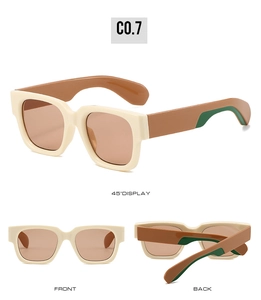 Three perspectives of chunky square sunglasses with cream frames and green interior accents