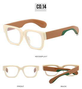 Detail view of square frame sunglasses with cream white front and bicolor temples