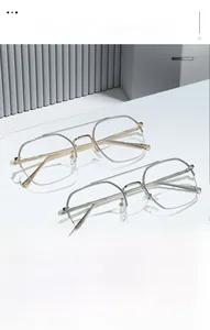Detailed view of dual-bridge irregular metal glasses frames in gold and silver colors