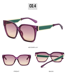 Detail view of purple gradient square sunglasses with green and gold temple accents