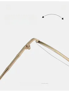 Detailed close-up of a durable gold alloy metal hinge with high-precision screw joints