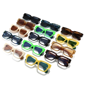 Multiple stylish square frame sunglasses in various colors displayed on white background