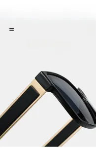 Detail of square sunglasses showing golden temples with light and elastic texture