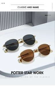 Détail de lunettes de soleil ovales rétro avec monture dorée en noir et marron