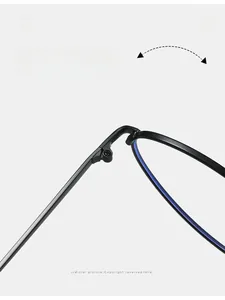 Detail of durable metal hinge on cat-eye glasses frame with blue light blocking lenses