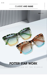 Detailed close-up of marble pattern cat-eye sunglasses with gradient lenses