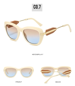 Three-way view of beige oversized sunglasses with gold metal temples and gradient lenses