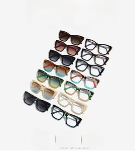 Flat lay of diverse cat-eye and square sunglasses with stylish patterns and textures