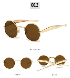 Vues détaillées de lunettes de soleil ovales en métal doré avec verres marrons et pont