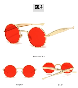 Vues détaillées de lunettes de soleil ovales en métal doré avec verres rouges