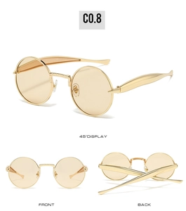Trois perspectives de lunettes de soleil ovales en métal doré avec verres jaune clair