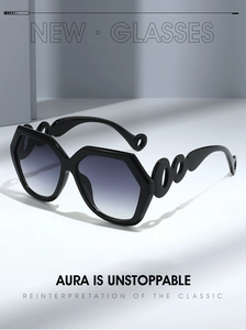 Detail of geometric hexagon sunglasses with hollow ring temple and dark gradient lens