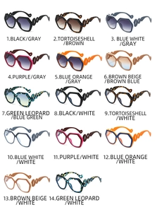 Collection of oversized hexagonal sunglasses and clear lens glasses in 14 varied color patterns