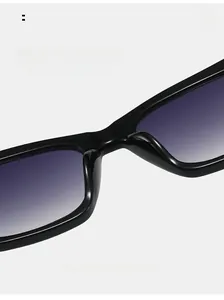 Detail of comfortable integrated nose pads on black cat-eye sunglasses with purple lenses