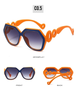 Three angles of bold geometric sunglasses with orange frames and round cutout temples