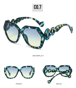 Three-way view of geometric oversized sunglasses with tortoiseshell frames and gradient lenses