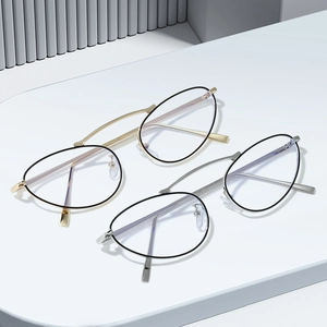 Cat eye blue light blocking glasses with teardrop metal frames in gold and silver