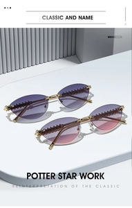 Detail of rimless cat-eye sunglasses with gradient lenses and gold rivet metal temples