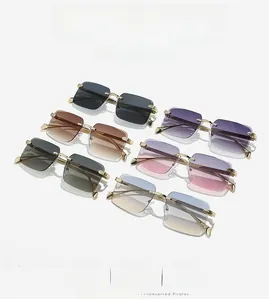 Collection of frameless rectangle sunglasses with gold metal temples in six gradient colors