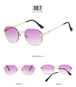 Detail view showing rimless purple gradient sunglasses with gold metal frame and black tips