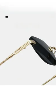 Detail of rimless sunglasses featuring twisted metal temples and high-quality hinges