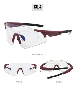 Detail view of sports goggles with red and black frame plus removable inner optical insert