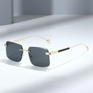 Frameless rectangle sunglasses with gold metal temples and dark grey lenses for a chic look