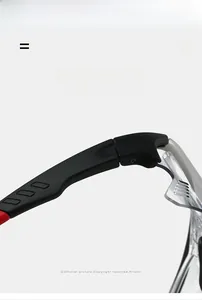 Detail of super elastic hinge on lightweight cycling sunglasses with red accents