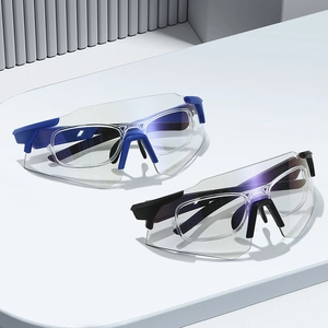 Outdoor cycling glasses in blue and black with integrated myopia frame and clear lenses