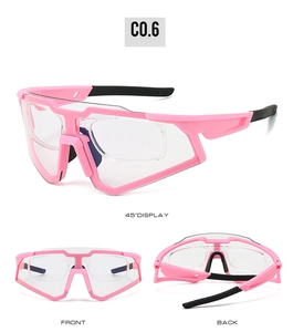 Detail view of pink cycling glasses with inner frame for prescription lenses and clear lens