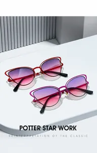 Close-up of red and purple cat eye sunglasses with gradient lenses on white display