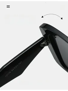 Detail shot of durable reinforced metal hinge on glossy black square frame sunglasses