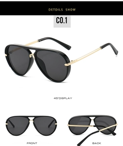Detailed views of black aviator sunglasses with gold metal temples and dark grey lenses