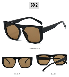 Detailed view of square oversized sunglasses with glossy black frames and tea brown lenses