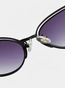 Detail of comfortable silicone nose pads on black cat-eye sunglasses for long-term wear
