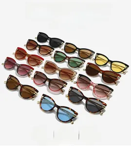 Collage of cat-eye sunglasses in various colors showing golden temple hinges and frames