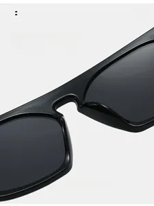 Close-up of seamless integrated nose pads on black square oversized sunglasses frames