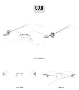 Detail of luxury rimless sunglasses with clover diamond hinges and polygonal cut lenses