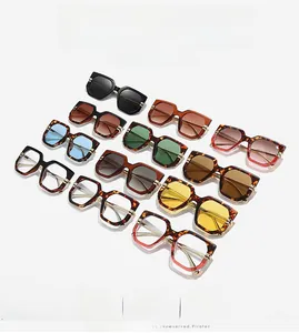 Selection of oversized square sunglasses in tortoise, black and transparent pink frames