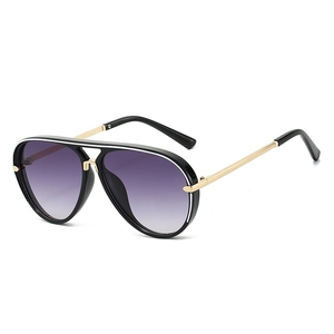 Modern aviator sunglasses with black frames, purple gradient lenses, and gold metal temples