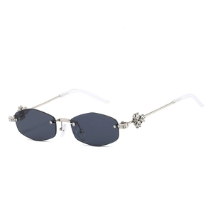 Luxury rimless polygon sunglasses with grey lenses and crystal rhinestone accents